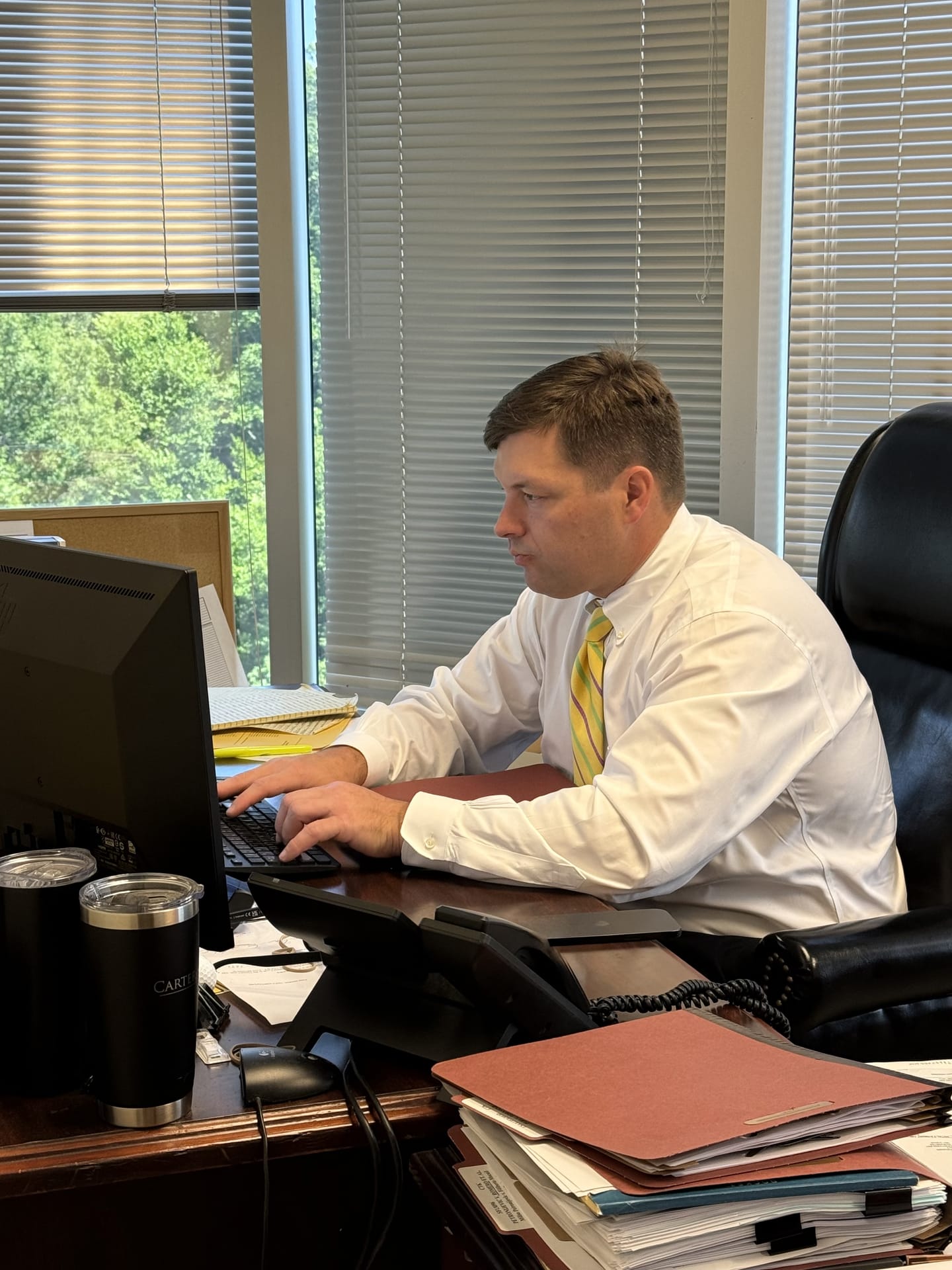 Carter Taliaferro Keeney, Esq. at his desk